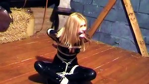Latex-clad Blonde With Big Tits Tied Up With Chains And Ropes