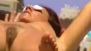 Homemade Video Of The Pussy Getting Nice Suntan On The Beach