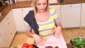 Bree Olson Flashes Her Great Smile While Cooking Some Food