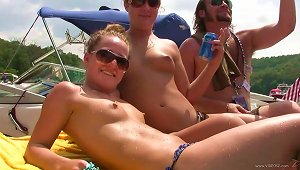 Randy Chicks On The Yacht Party Licking On Natural Tits